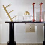 <p><strong><a href=ettore-sottsass.html class=link-lightbox>Ettore Sottsass</a></strong><br />Bharata</p><p><strong>Acropoli</strong><br />Side table in lacquered wood, marble, stainless<br />steel, gilded wood and halogen lamp.<br />200 x 55 x h. 184 cm. </p>