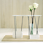 <p><strong><a href=andrea-branzi.html class=link-lightbox>Andrea Branzi</a></strong><br />Blister</p><p><strong>MTX 07</strong><br />  Table centrepiece  with base in natural wood, vase in blown glass, supports  in stainless steel and top in enamelled metal.<br />  49 x 26 x h. 25 cm.</p><p> Limited edition of 20  signed and numbered pieces.</p> 
